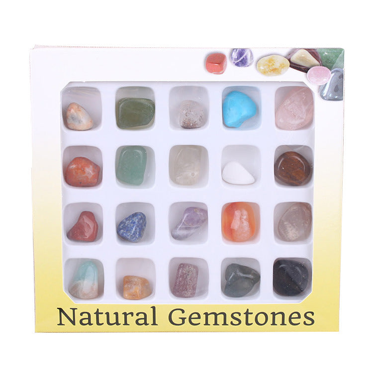 Set of natural gemstones in a display box with a gradient background