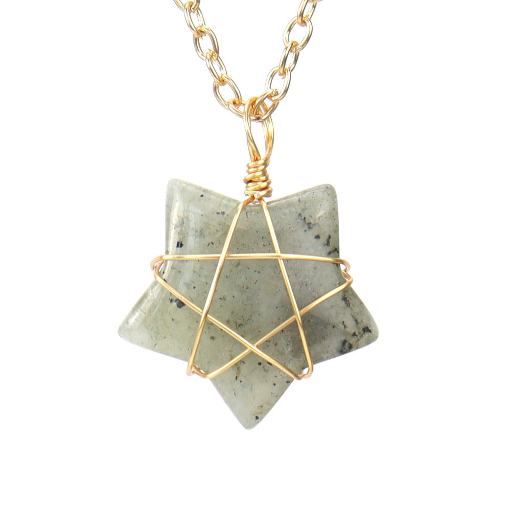 Necklace with a geometric stone pendant on a white background