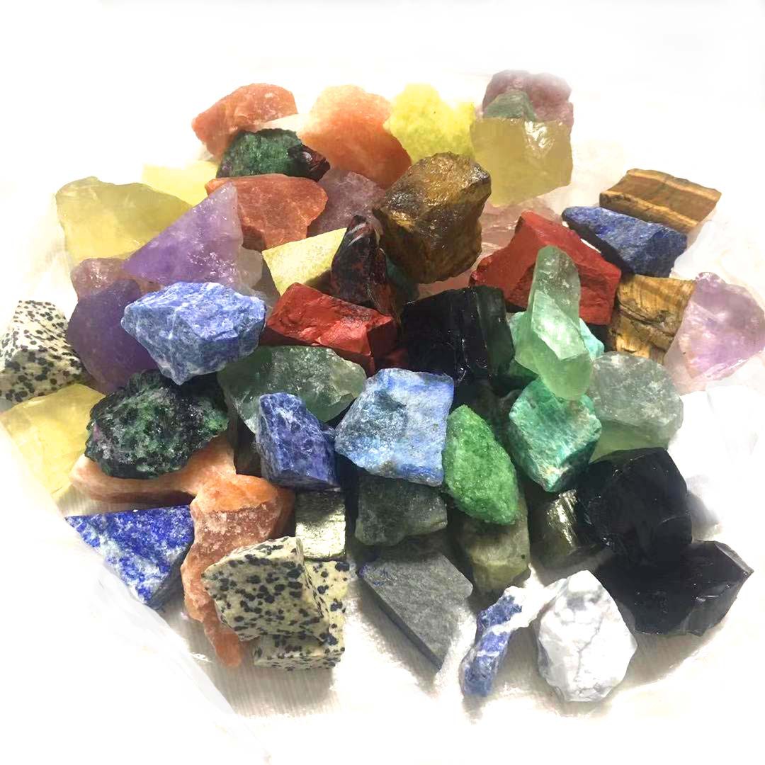 Assorted colorful crystals on a white background