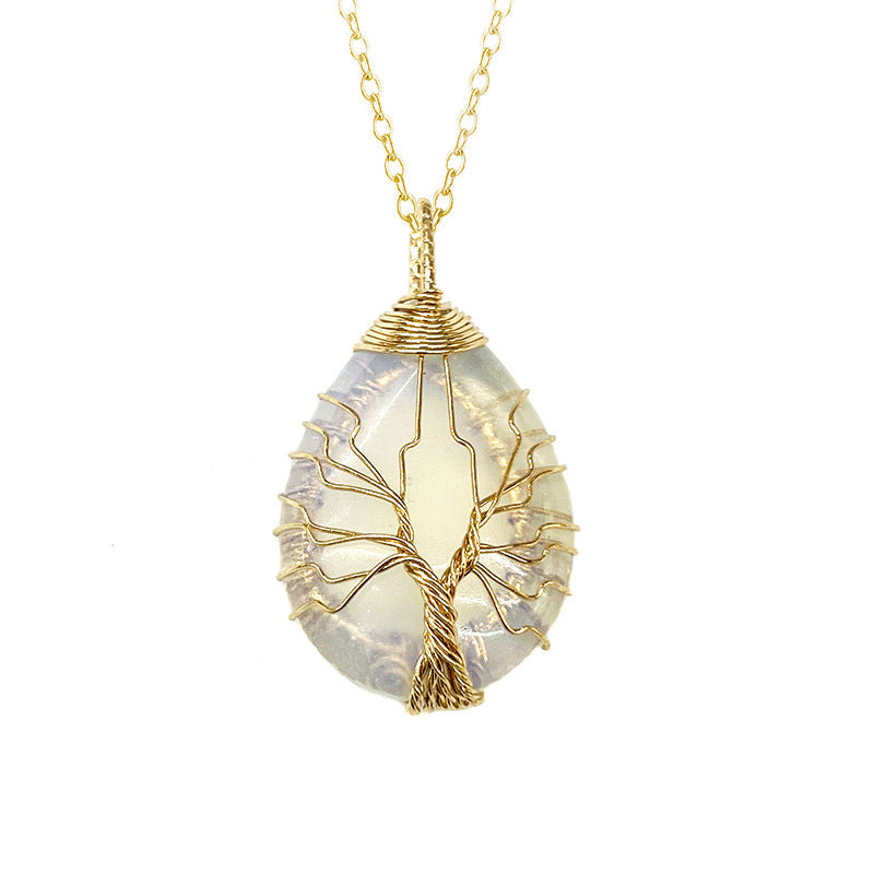 Necklace with a tree-of-life design pendant on a white background