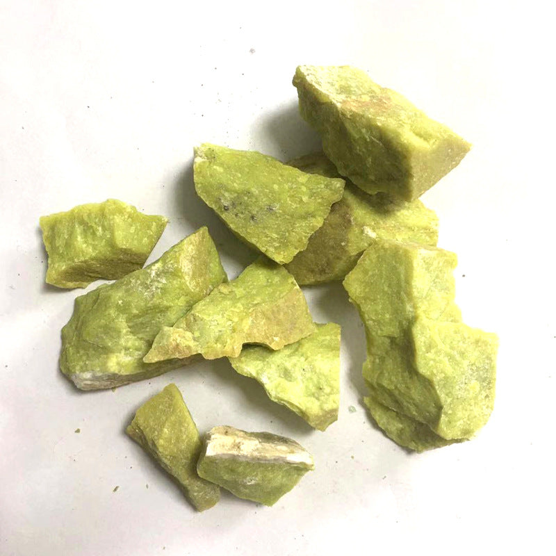 Green crystal rocks on a white background