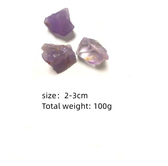 Three purple crystals on a white background with text indicating size and weight.