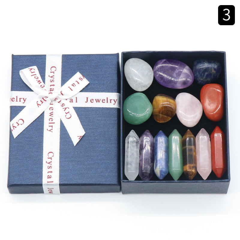 Polished crystal stones in colorful natural stone gift box