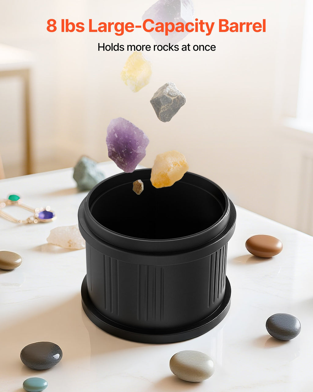 Black large-capacity barrel with rocks on a table