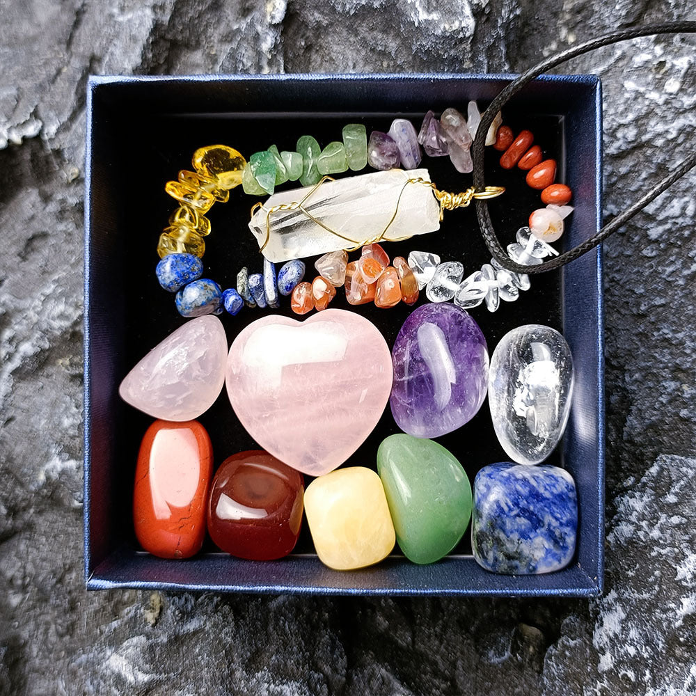 Close-up of polished agate and jade stones in gift box