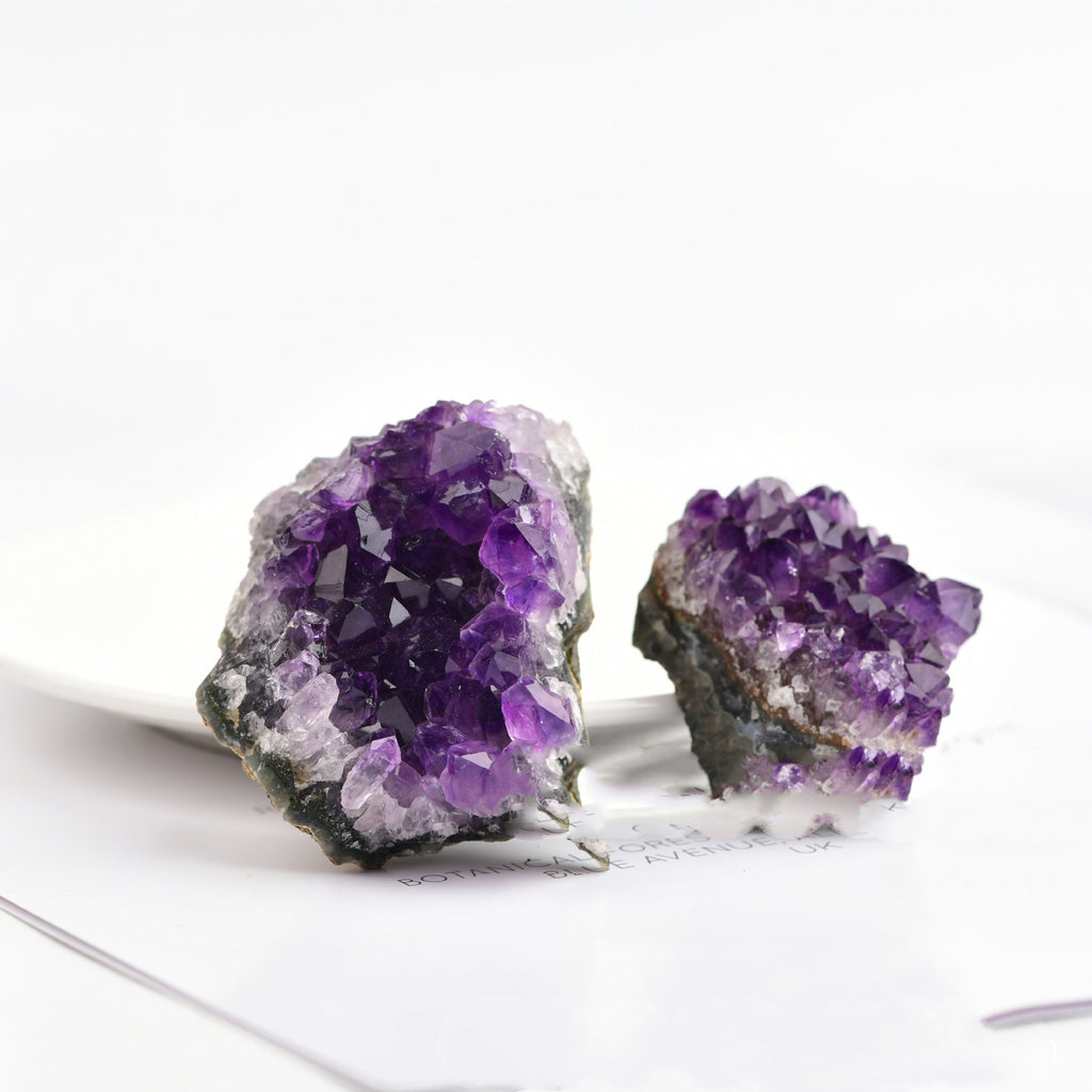 Amethyst crystal  on a white background